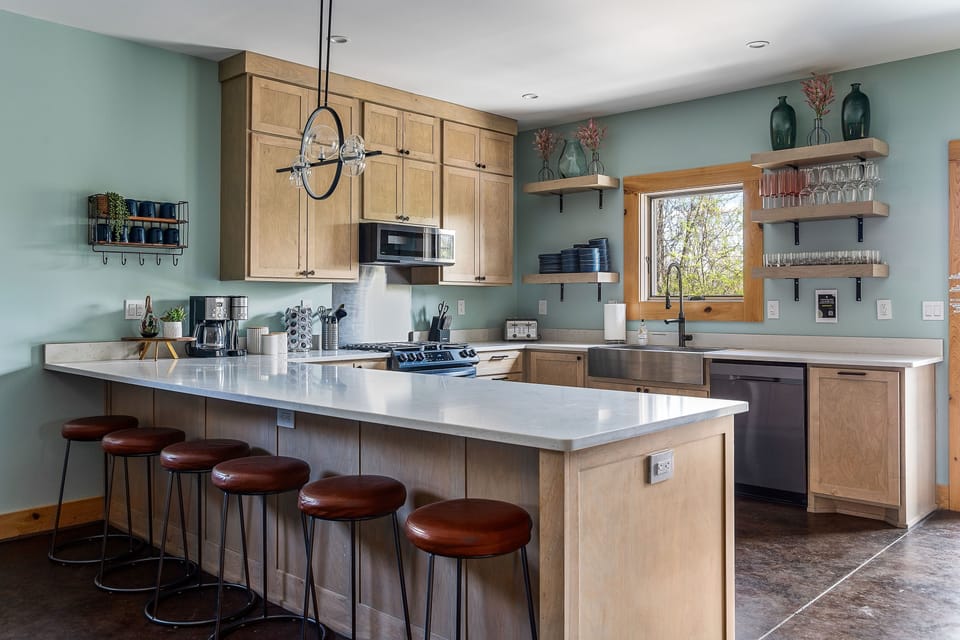 You will have plenty of room to pull up to the bar for a snack, coffee, or to chat with your group's chef (whoever that may be!)