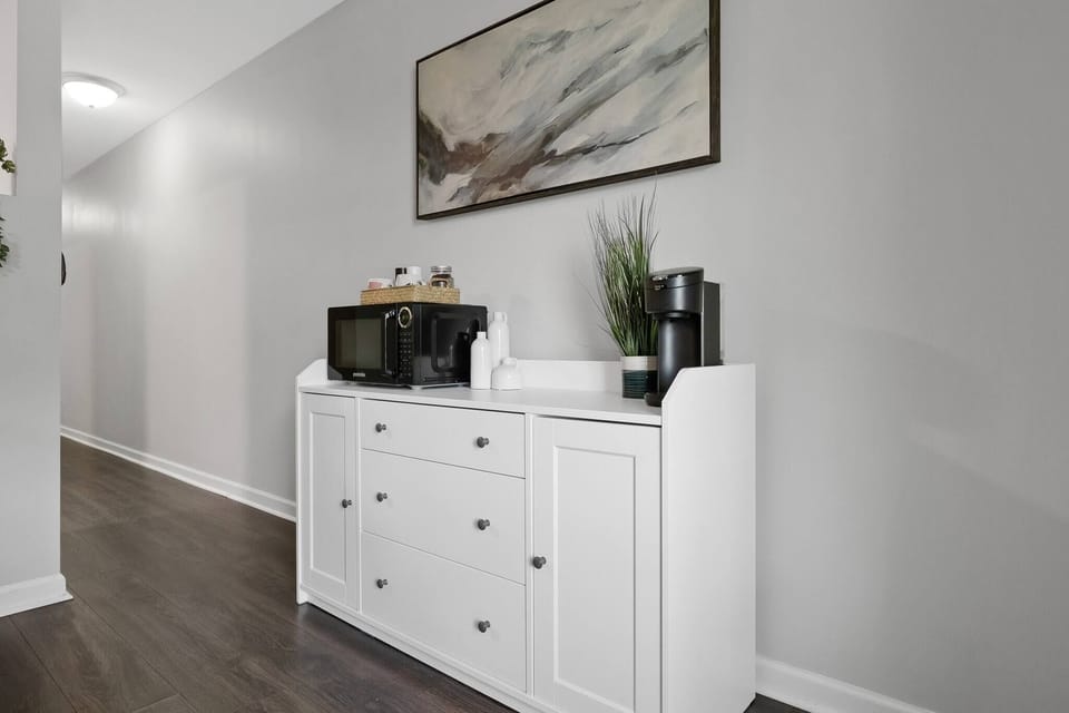 There is a microwave ready for heating up delicious meals and a coffee maker to help your prepare that perfect caffeine drink that will give you that needed energy early in the morning!