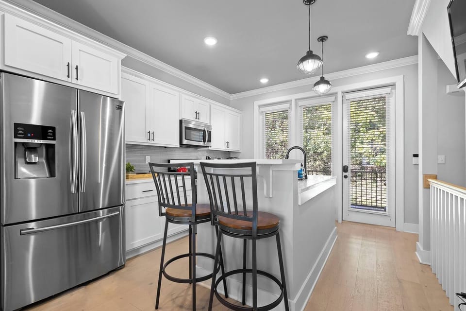 A specious refrigerator is available, two high chairs, and a welcoming atmosphere perfect for those home cooks! 