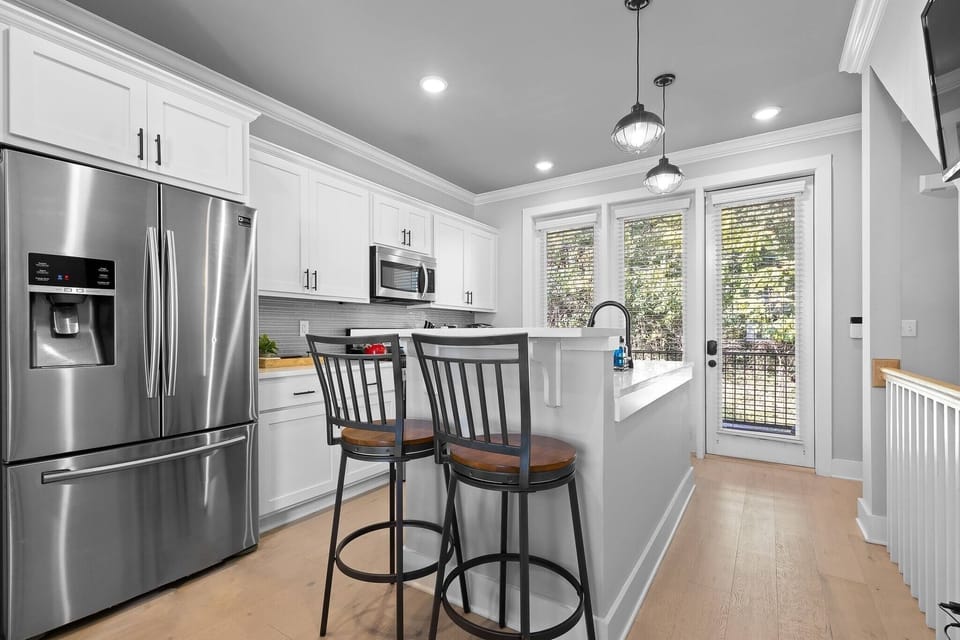 A specious refrigerator is available, two high chairs, and a welcoming atmosphere perfect for those home cooks! 