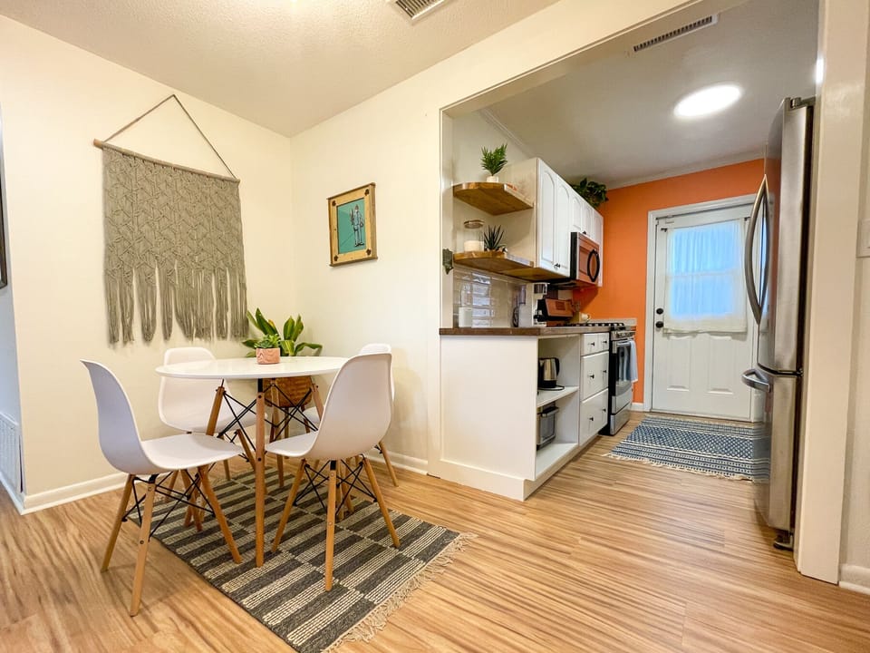 4-6 seat dining area, open to living area and kitchen.