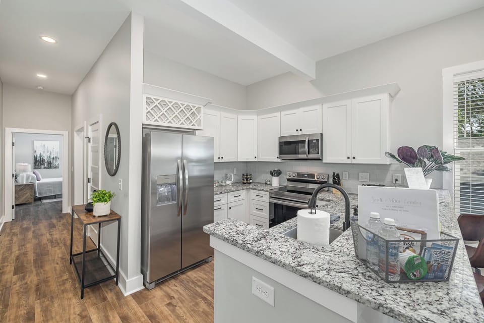Open-concept living with spacious kitchen.