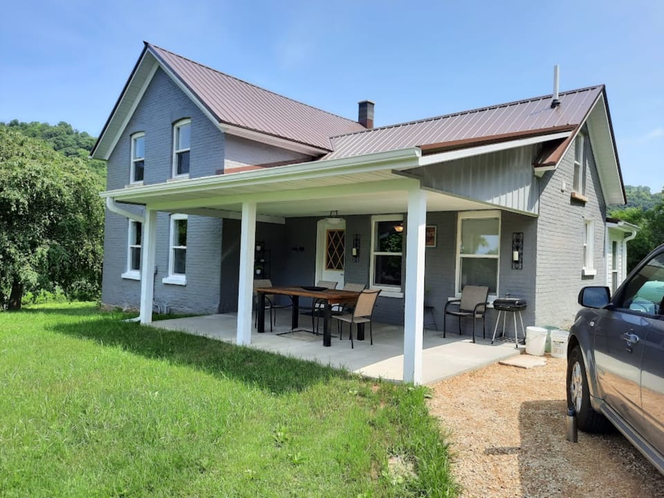 A gravel drive right up to the house.