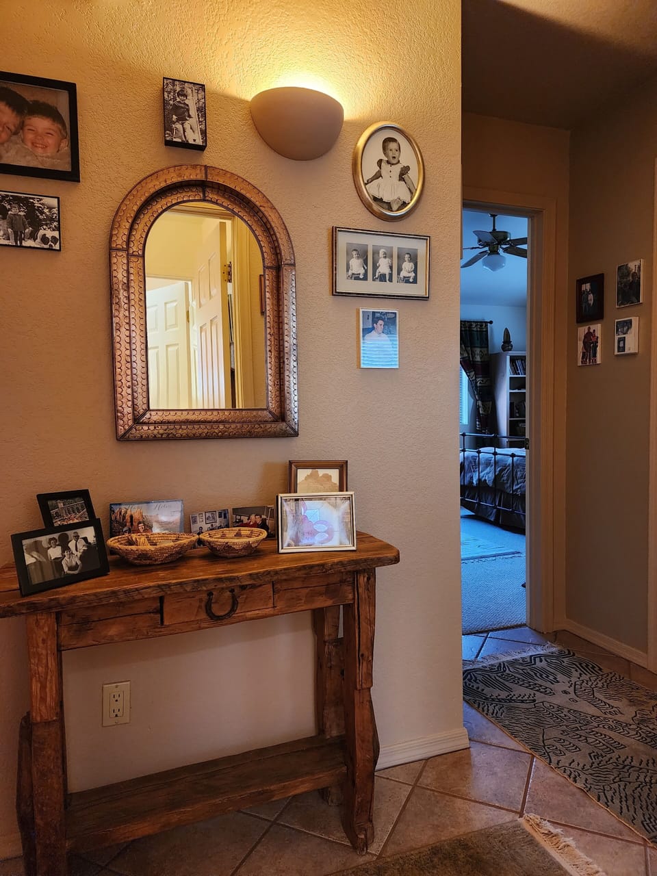 Hallway. Home has family photos and memorabilia. 