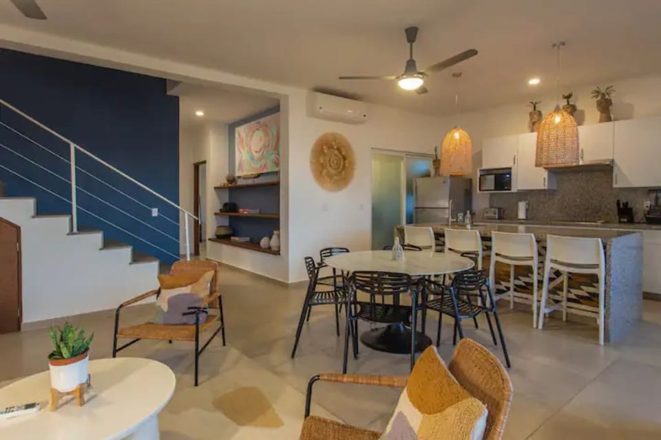 Living room and open kitchen floorplan.