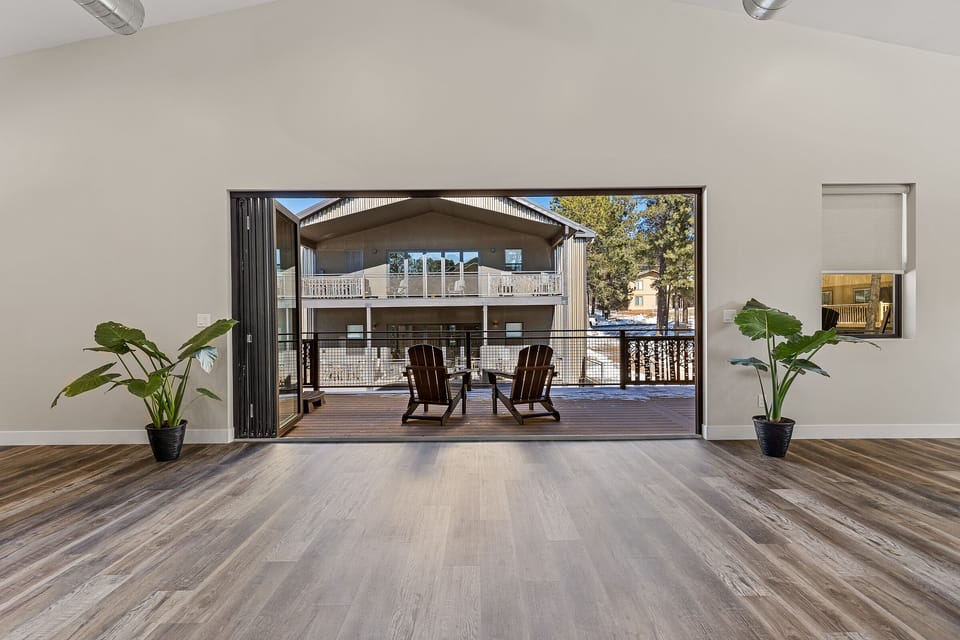 View through push back doors across the courtyard to Aspen Ridge retreat (separate rental)