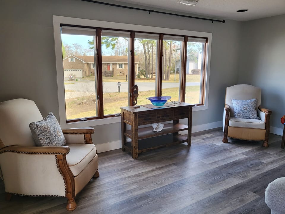 Living room looking towards the front with additional seating.