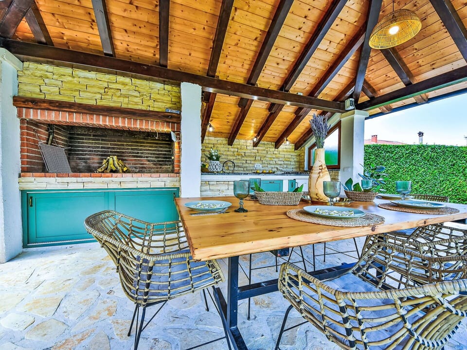 Table, Furniture, Building, Azure, Outdoor Furniture, Interior Design, Wood, Shade, Chair, Window