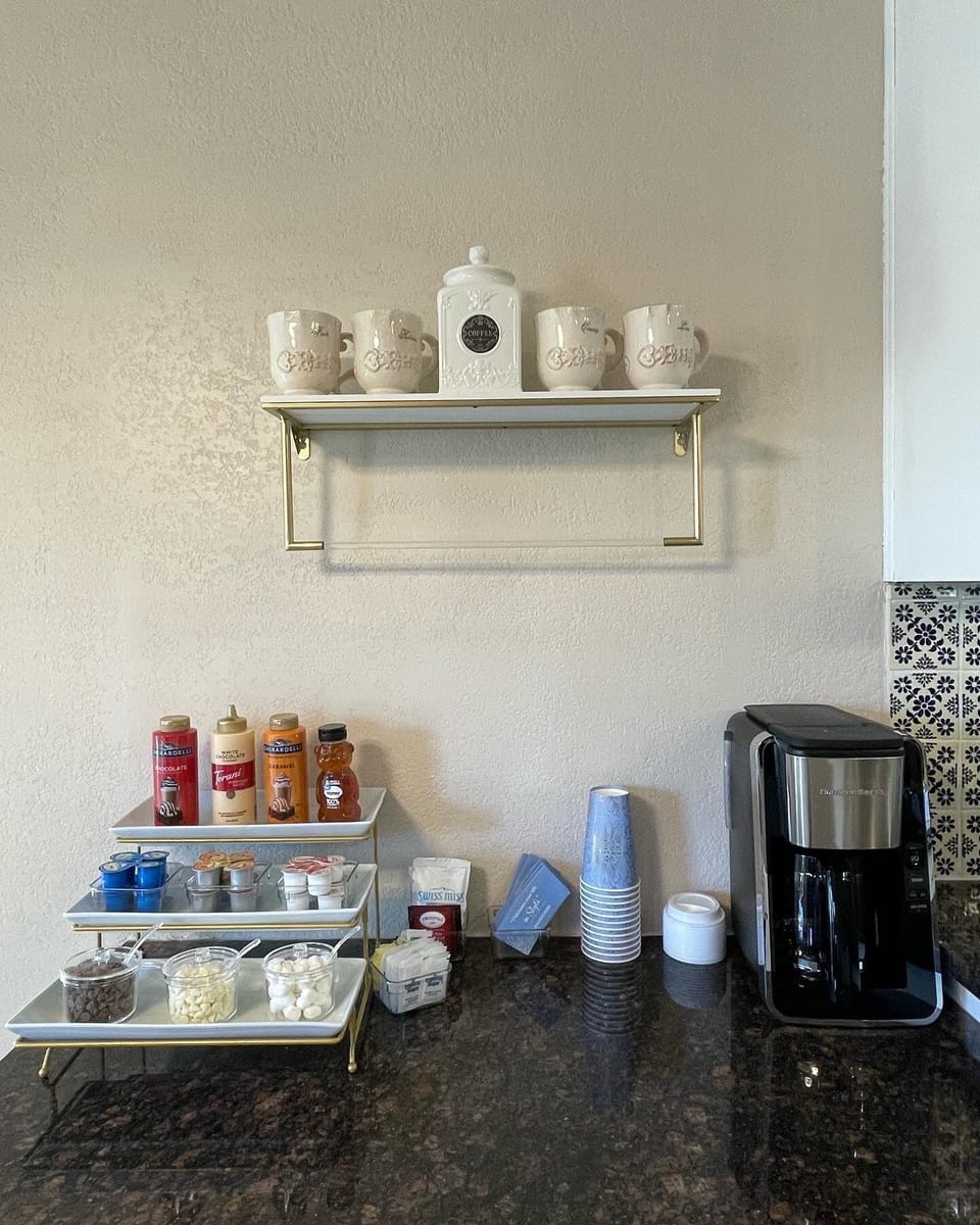 Complementary hot cocoa/tea/& coffee bar