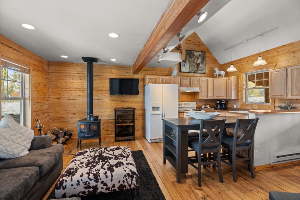 Living room, open to kitchen and dining. 