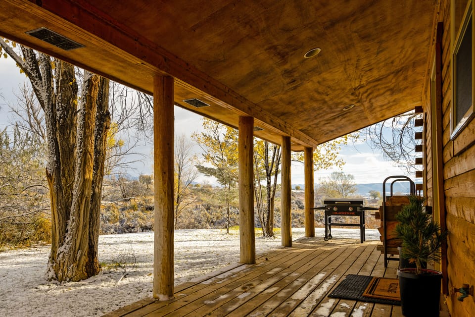 Covered deck with grill. 