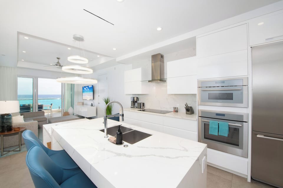 Full kitchen with top-of-the-line appliances plus a kitchen island with seating for 2. 