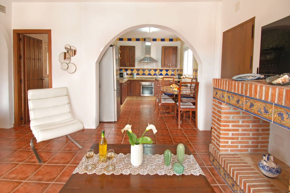 The open kitchen is fully equipped.