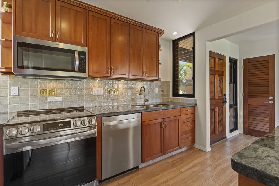 Well equipped & updated kitchen including full sized appliances