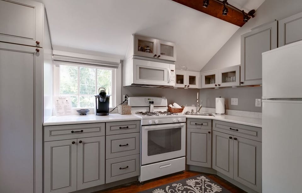 Fully equipped kitchen with everything you might need for meal preparation.
