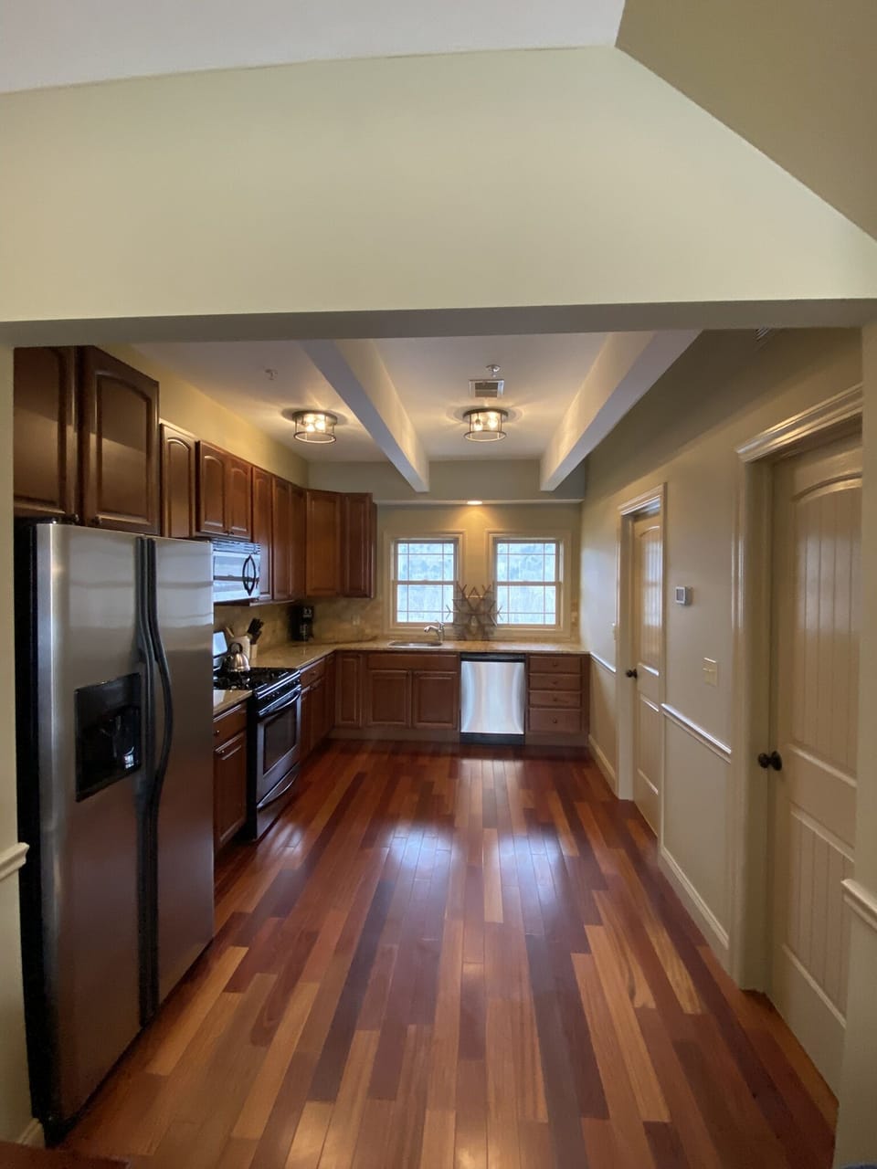 Fully Equipped Kitchen w granite countertops and stainless steel appliances 