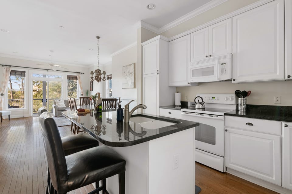 Fully Stocked Kitchen With Island Seating for 2