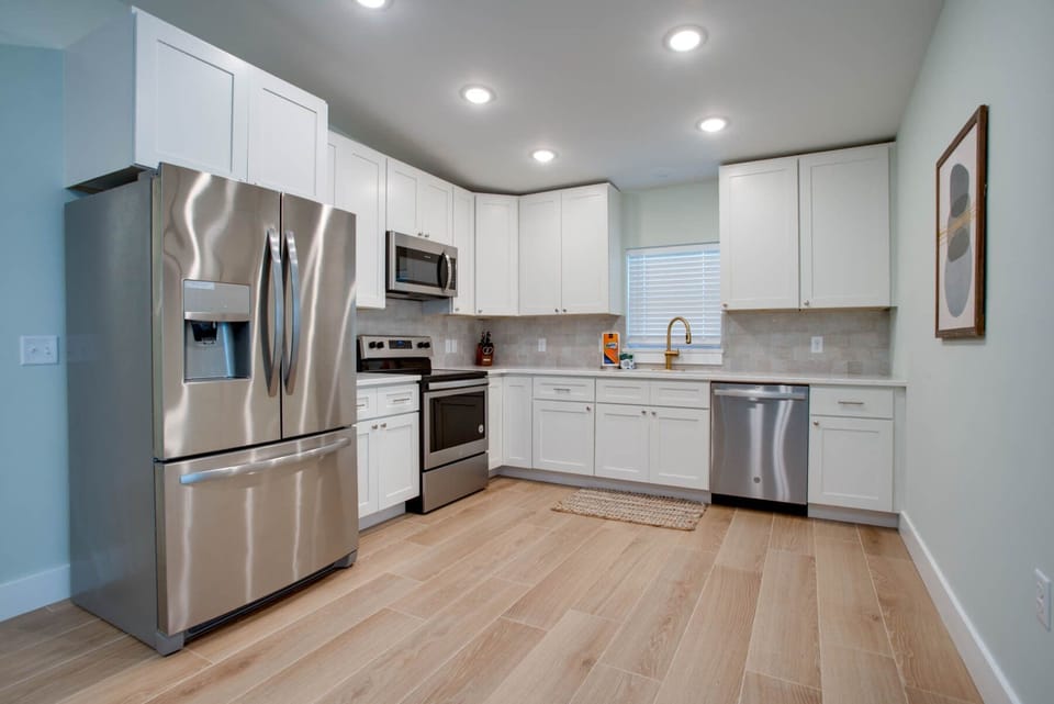 Kitchen- brand new stainless steel appliances. Large french door fridge