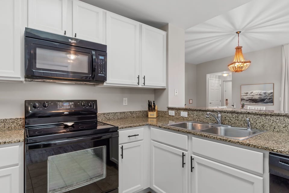 Plenty of room for the Chef of the family in this fully stocked Kitchen. 