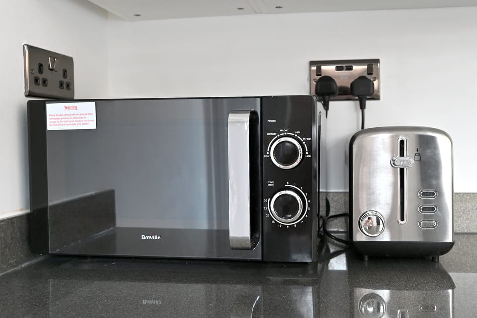 Microwave and toaster. 