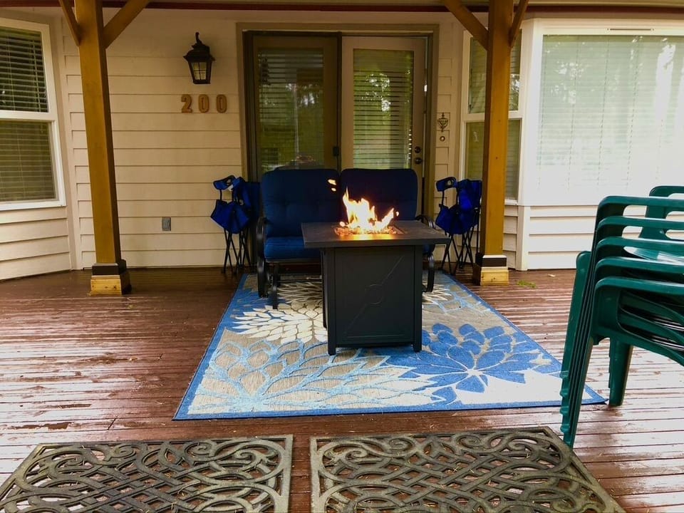 Outdoor deck fireplace plus swing