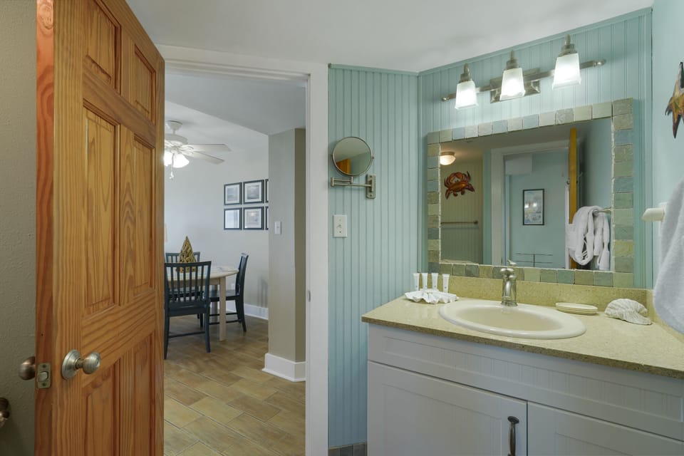 Modern coastal bathroom in this Destin beachfront condo