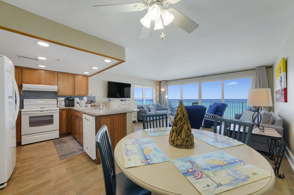 Open-concept kitchen and dining in Destin beachfront rental