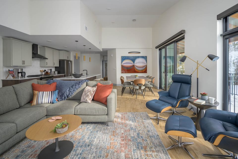The open living room boasts a modern and comfortable space to come together