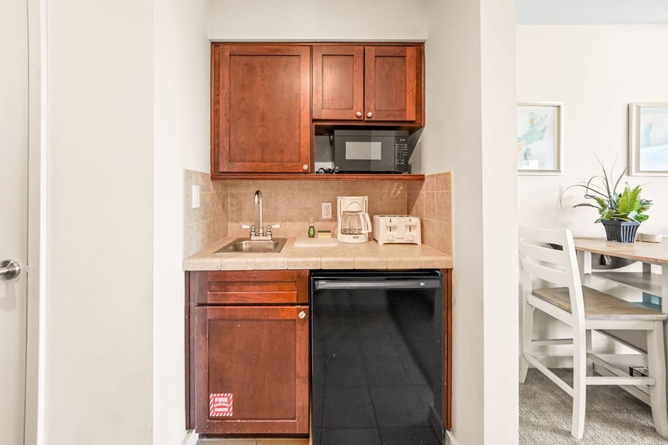 Kitchenette_ Microwave, Sink, Coffee Maker, Toaster, Mini-Fridge, Plates, Cups