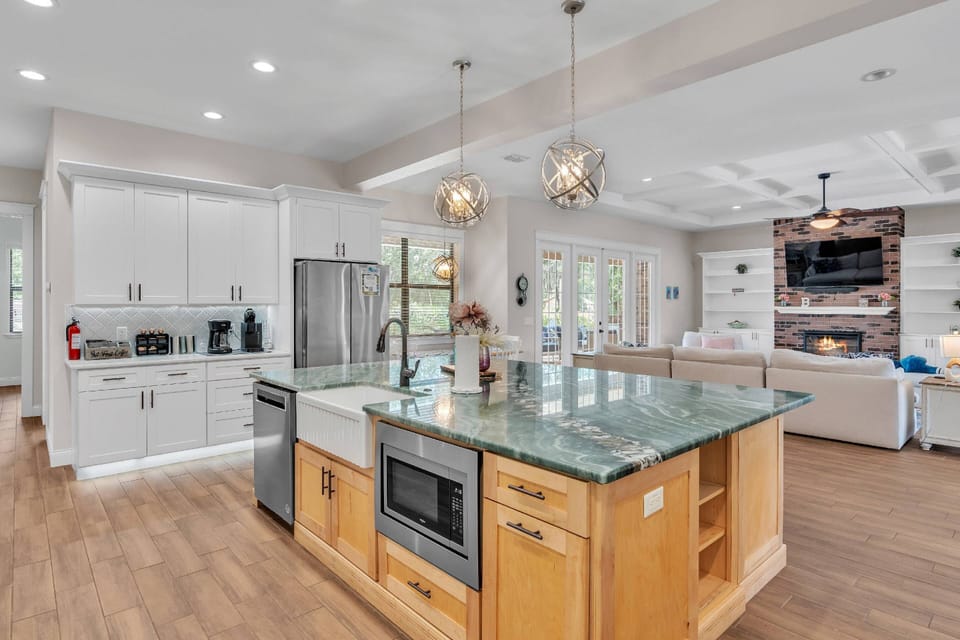 Gorgeous gourmet kitchen with large island to enjoy cooking with family & friends!