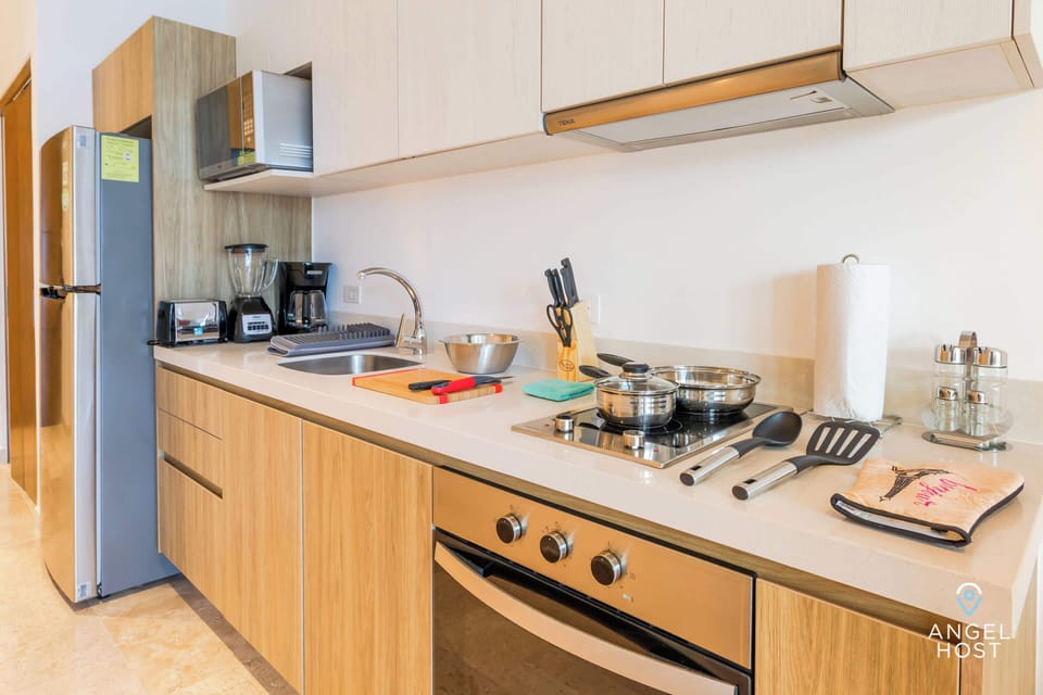 Fully-equipped kitchen with all the appliances and cookware you’d need to prepare a meal at home