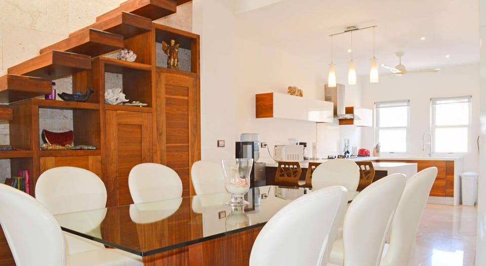 A stylish formal dining table that can seat 8 guests