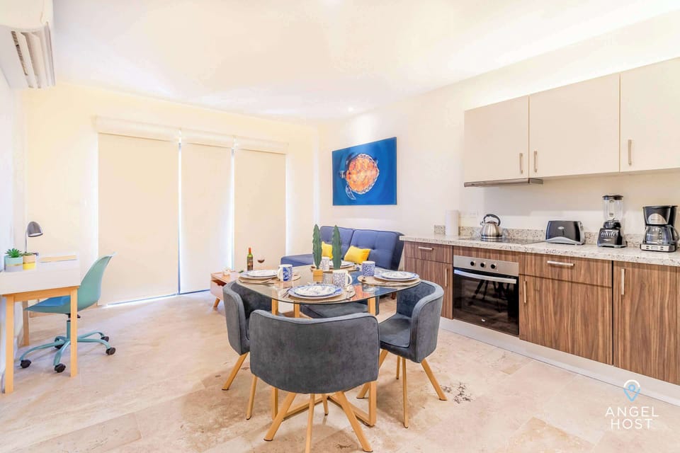 A comfortable dining table set for 4 guests