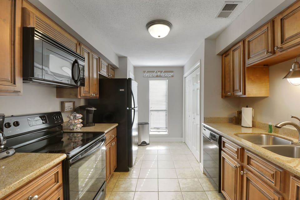 Kitchen – From Morning Light to Midnight Bites - With full-size appliances and thoughtful touches throughout, this well-stocked kitchen makes cooking (or reheating Ember leftovers) feel easy.