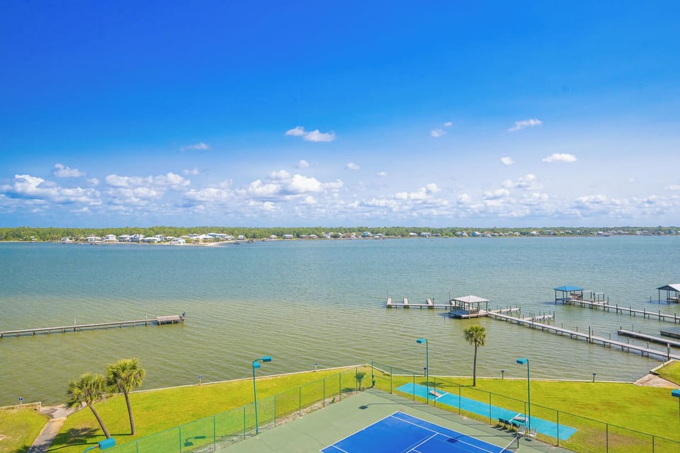 Immerse yourself in the coastal vibe as you enjoy your morning coffee from your balcony, overlooking the tranquil lagoon