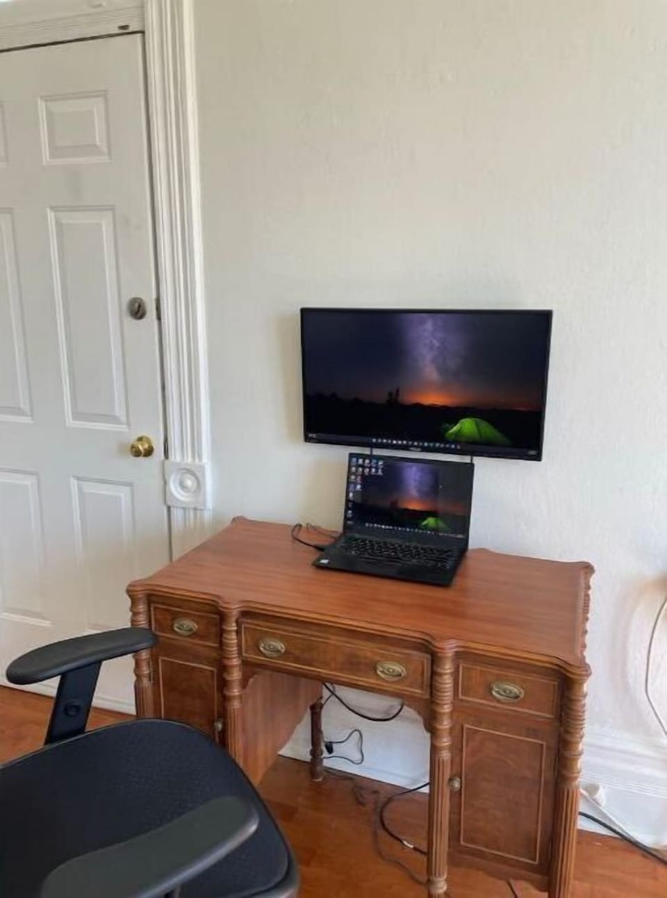 Study desk with a wall monitor and HDMI hookup for your laptop
