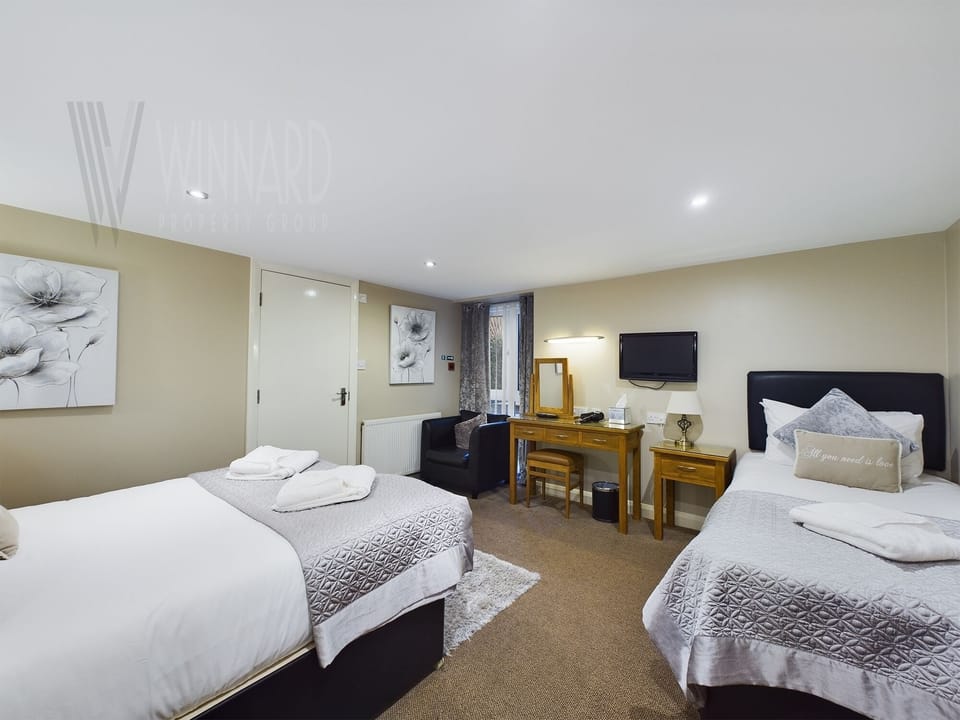 Bedroom With Double & Single Bed