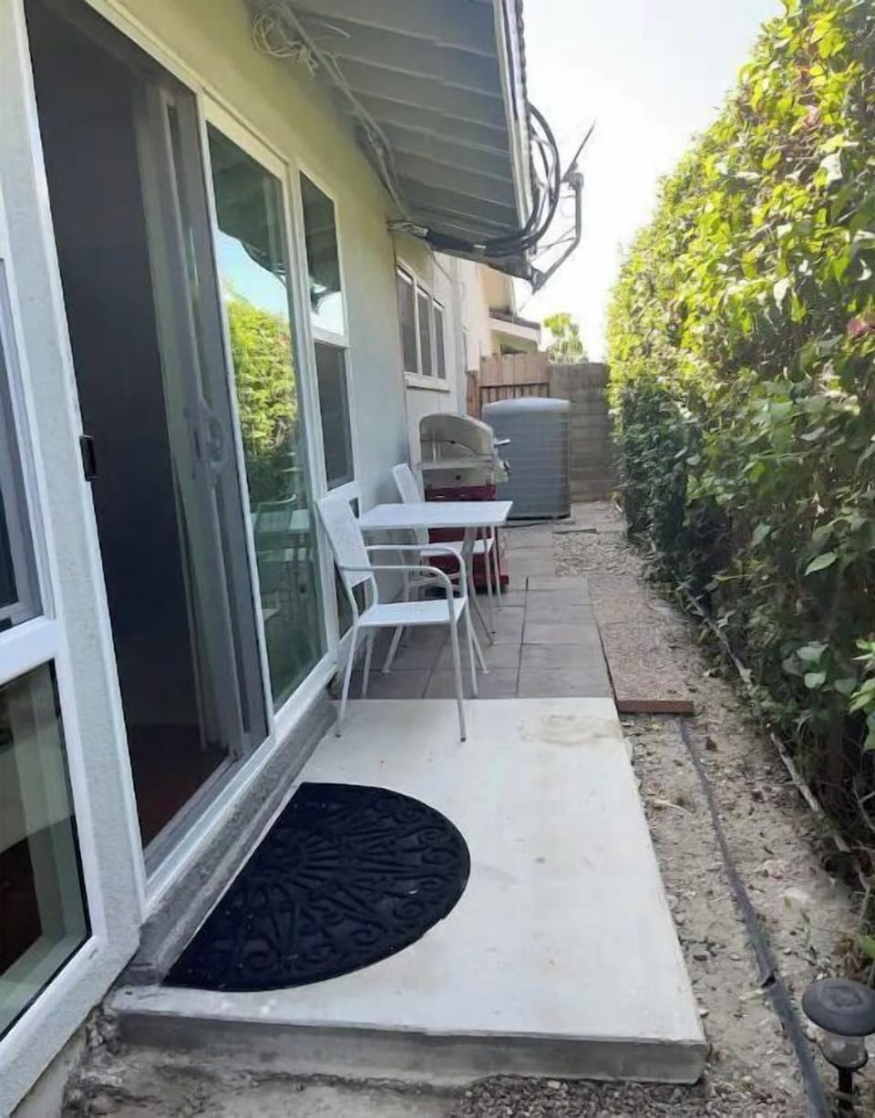 Small patio with a grill