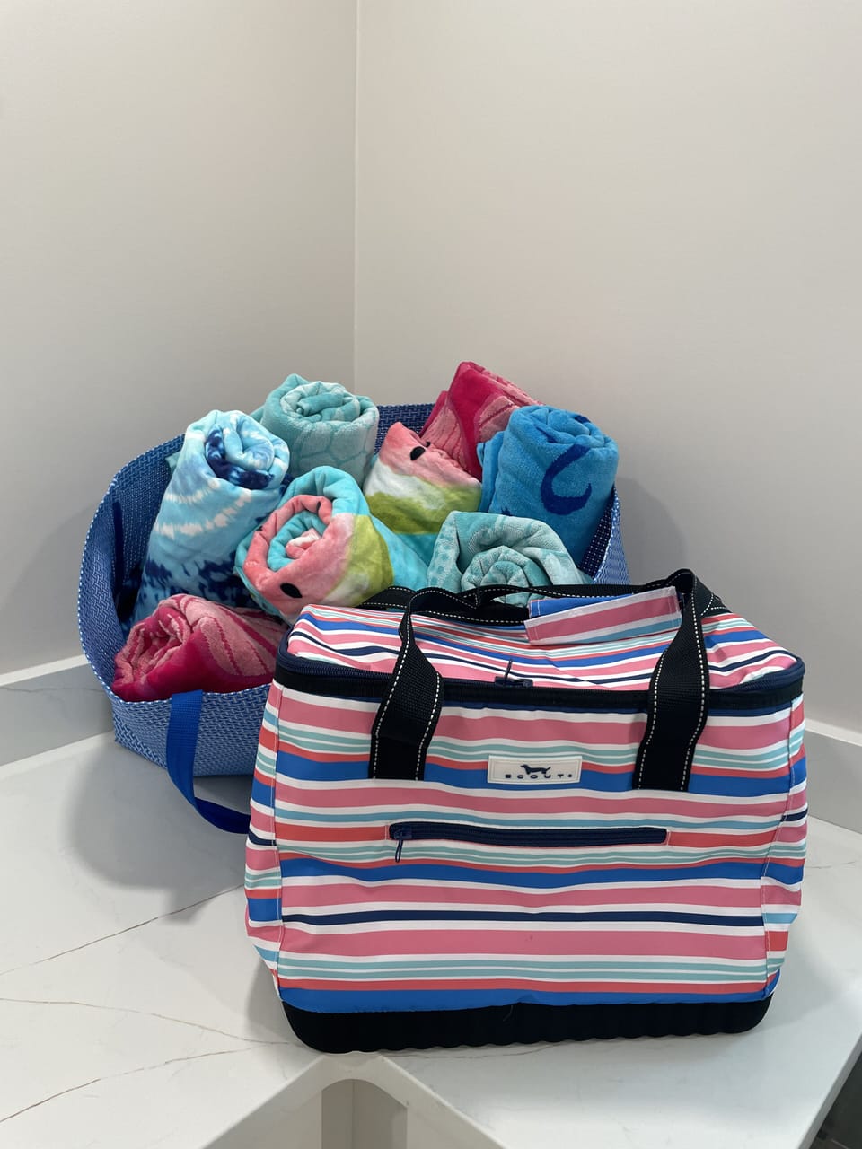 Large beach towels, beach bag and cooler for guests. 