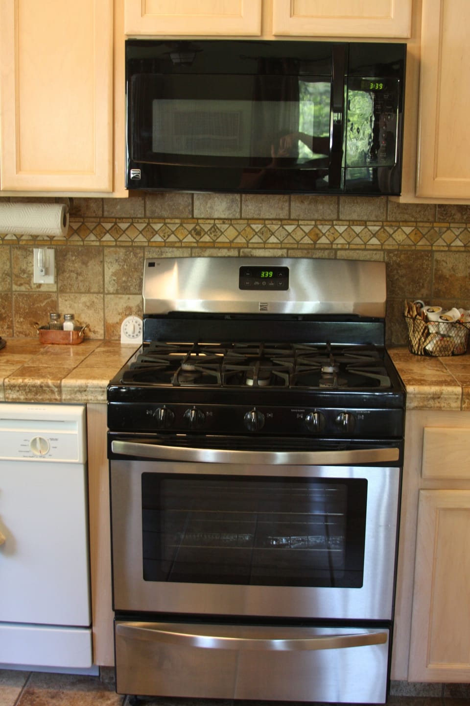 kitchen has full sized gas stove & oven 