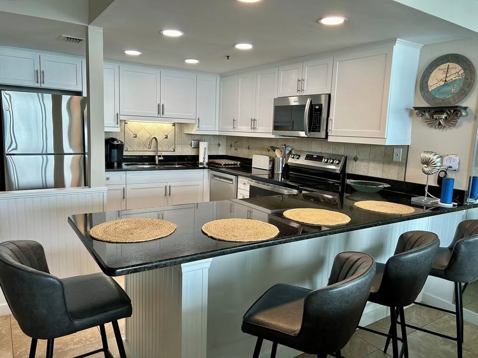 Kitchen with new appliances and cabinets