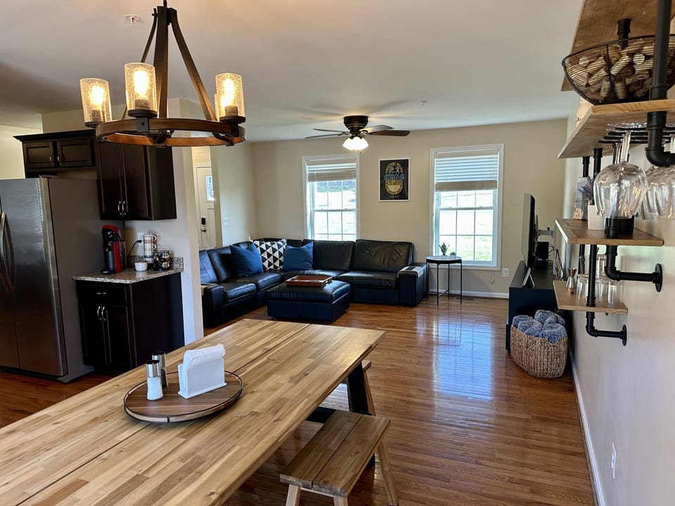 Dining room and living room with views of the front yard