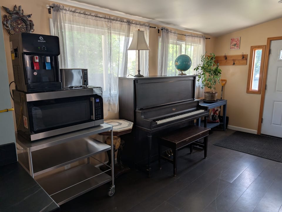 Lounge with a piano — a fun in-home touch