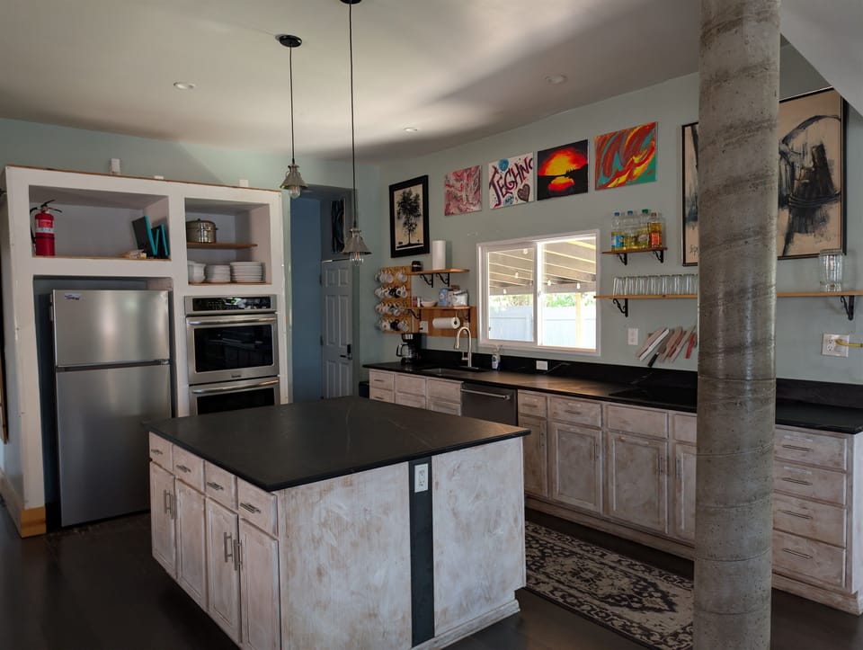 Fully equipped kitchen — island & stainless appliances