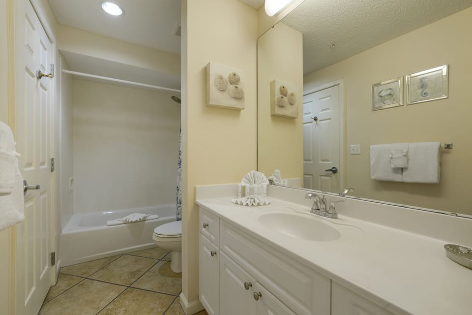 From sandy toes to evening dinners, this well appointed bathroom supports every part of your beachfront routine.