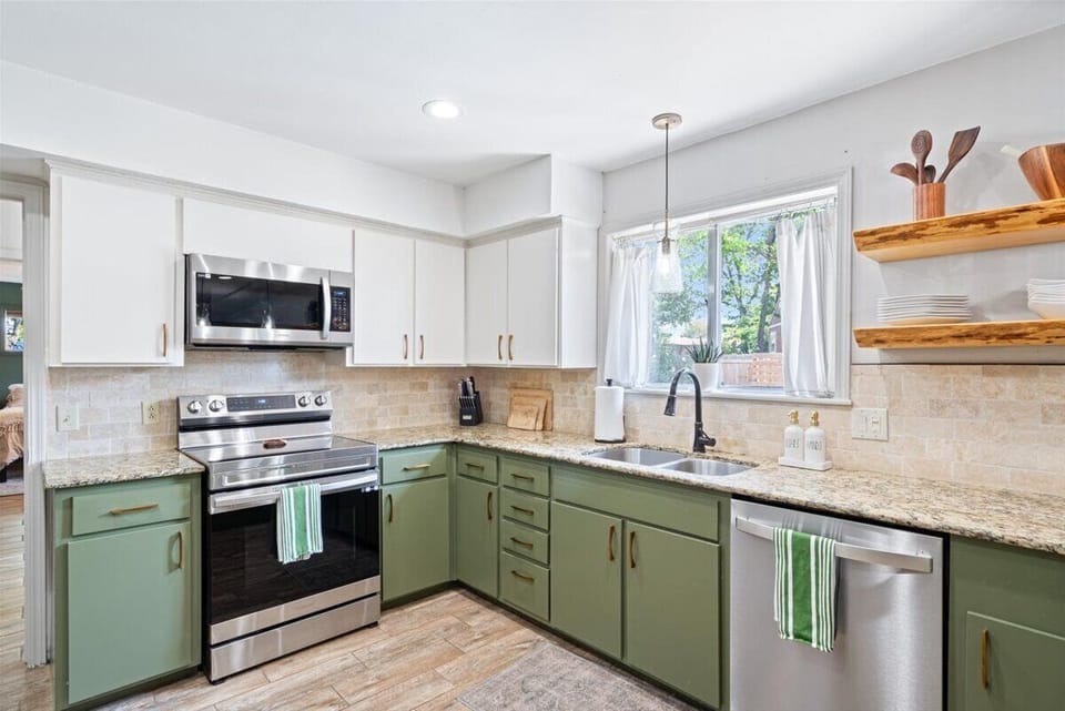 Fully stocked kitchen with stainless appliances