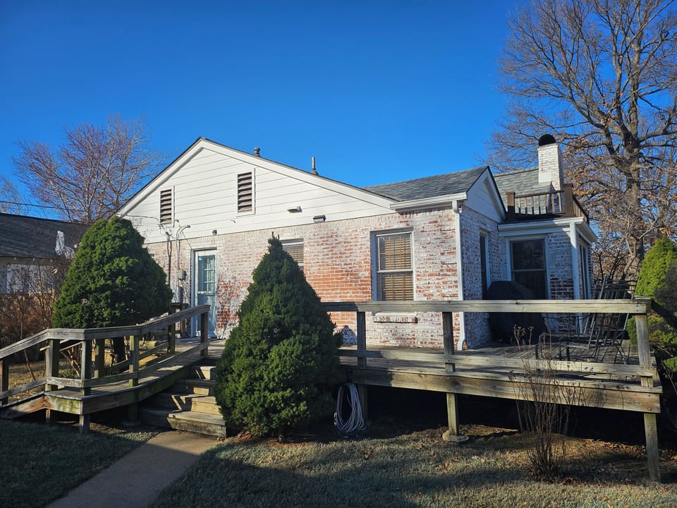 Back deck with patio furniture & natural gas grill
