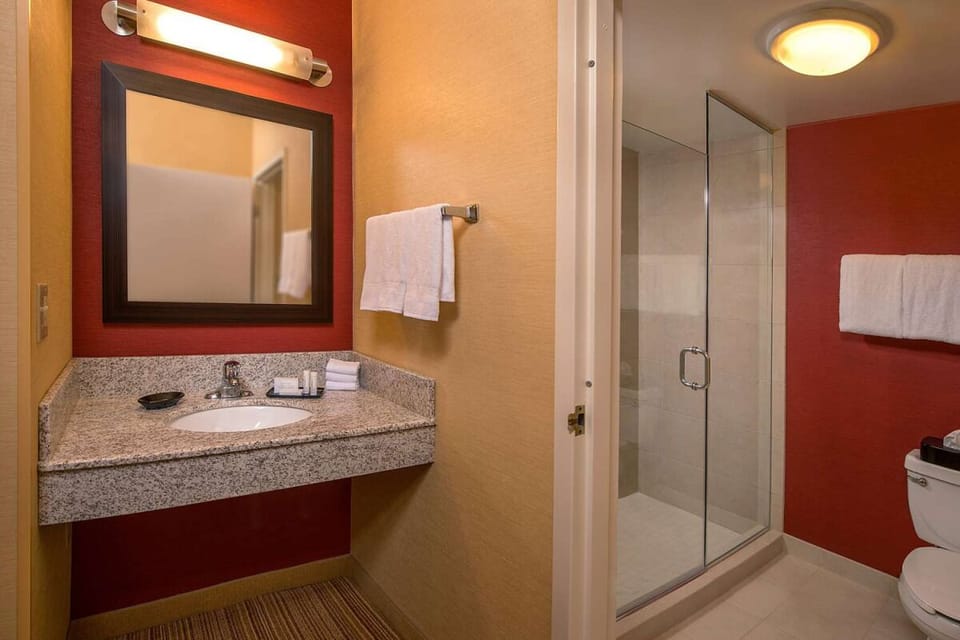 Step into a sparkling shower and enjoy fresh, fluffy towels.