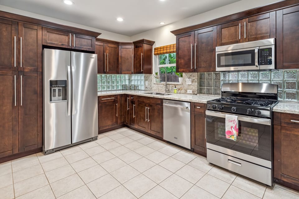 The recently updated kitchen has new appliances to ensure mealtime is a breeze.