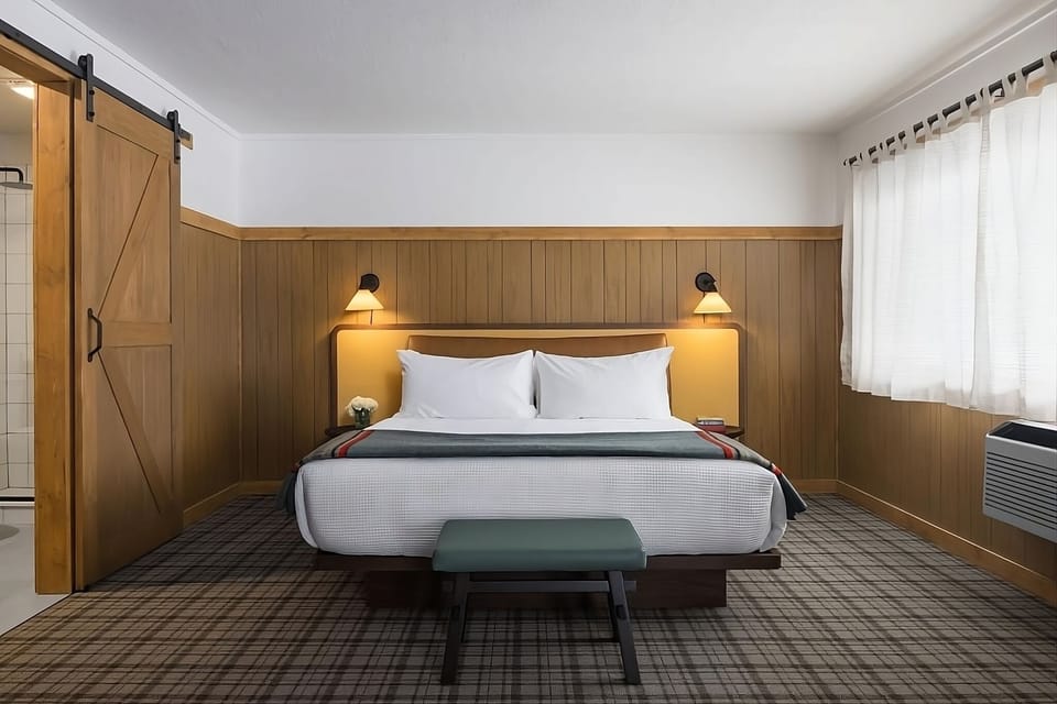 Sink into crisp linens and drift off in quiet comfort.
